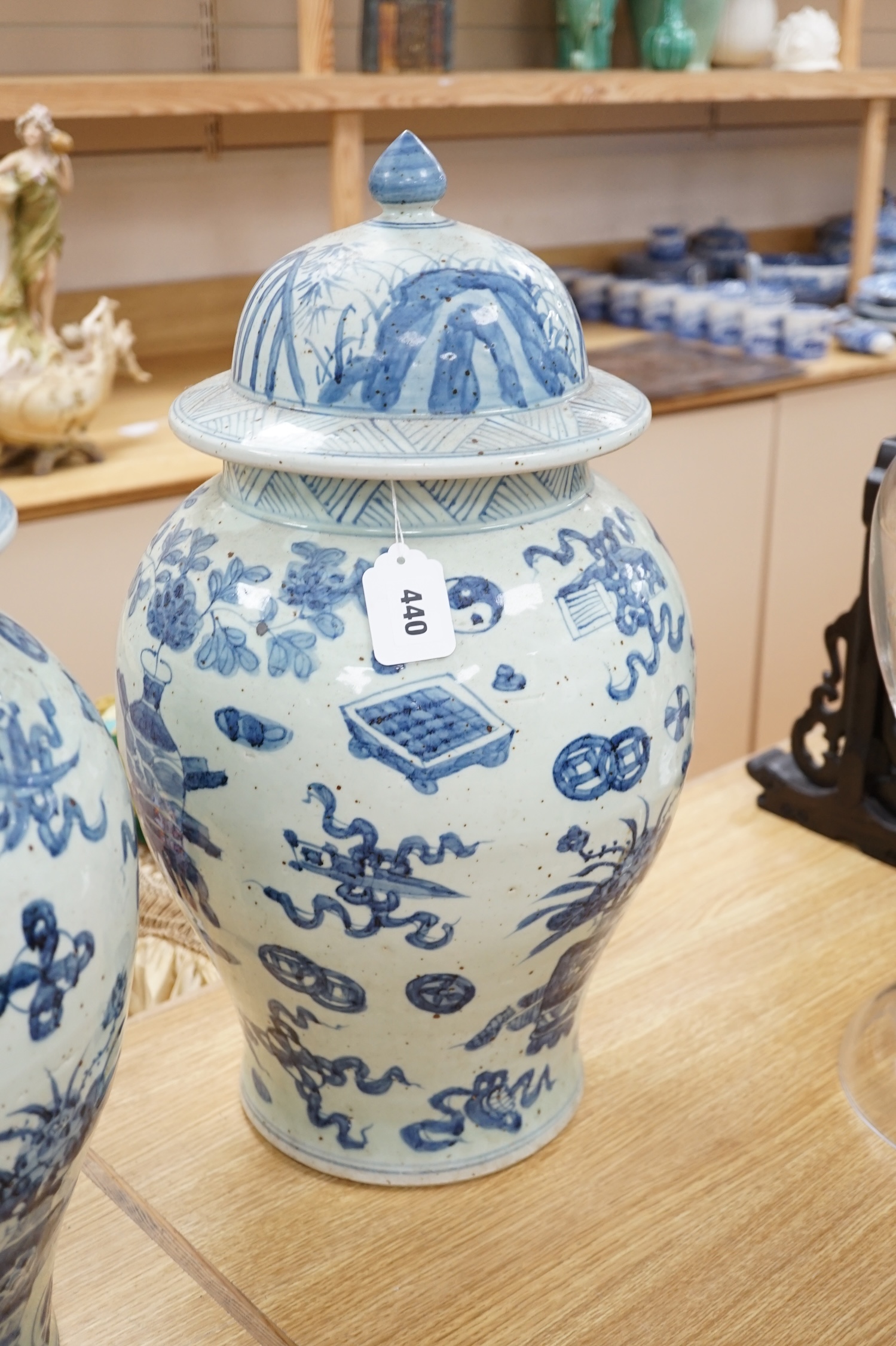A large pair of Chinese blue and white ginger jars and covers, 54cm high. Condition - fair to good